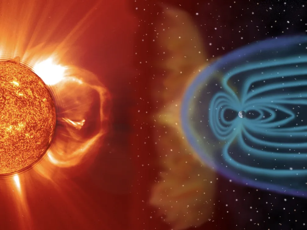 An image of a CME impacting an illustration of Earth's magnetic field