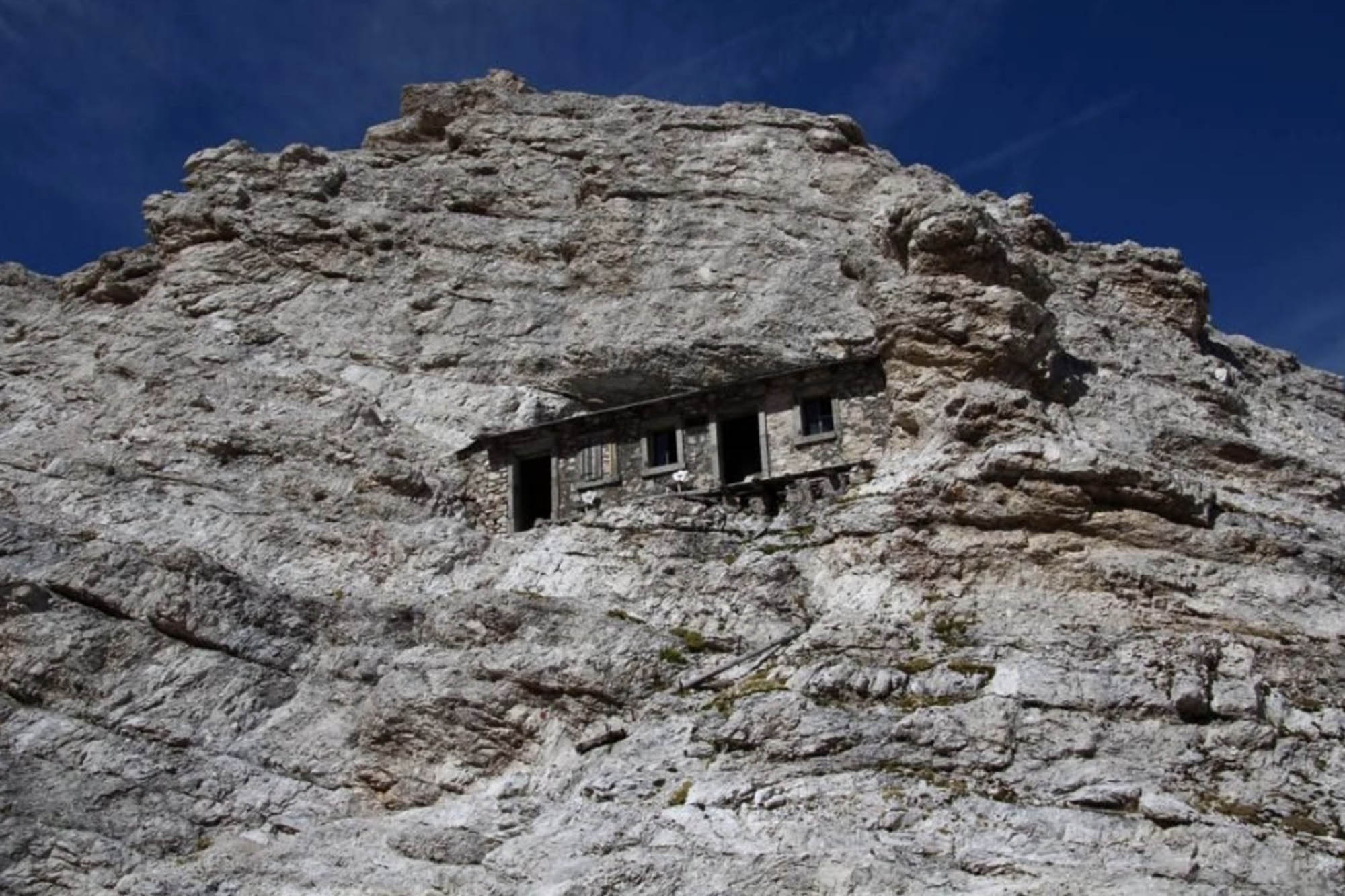 World's loneliest house built into side of remote mountain range has been  empty for 100 years