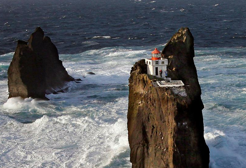 Incredible location for a lighthouse perched on a rock in Iceland's wild  surf - Iceland Monitor